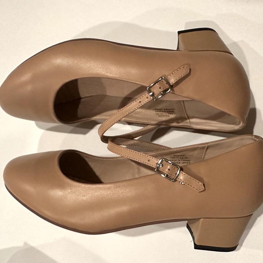 Never worn women’s 11 EE -extra wide shoes with strap. 
1.5” heel. Beige/tan